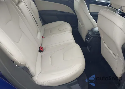 2015 Ford Fusion Energi Titanium from USA, damaged, VIN 3FA6P0SU2FR128700